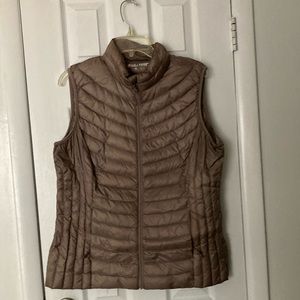 Ladies vest like new tan.